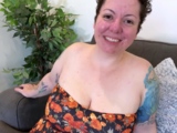 NIKKISFETISHES Pale Busty Woman Squeezes Breasts on Couch